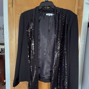 Black sequined open face jacket.